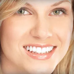A woman smiling